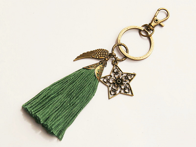 Schlüsselanhänger Taschenanhänger Glücksbringer Stern Flügel Quaste grün